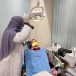 Dr-Tasmia-examining-patient-dental-clinic-treatment