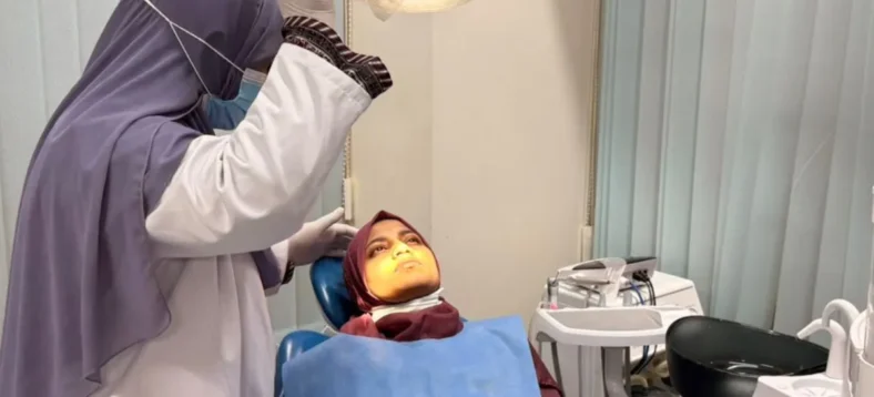 Dr-Tasmia-examining-patient-dental-clinic-treatment